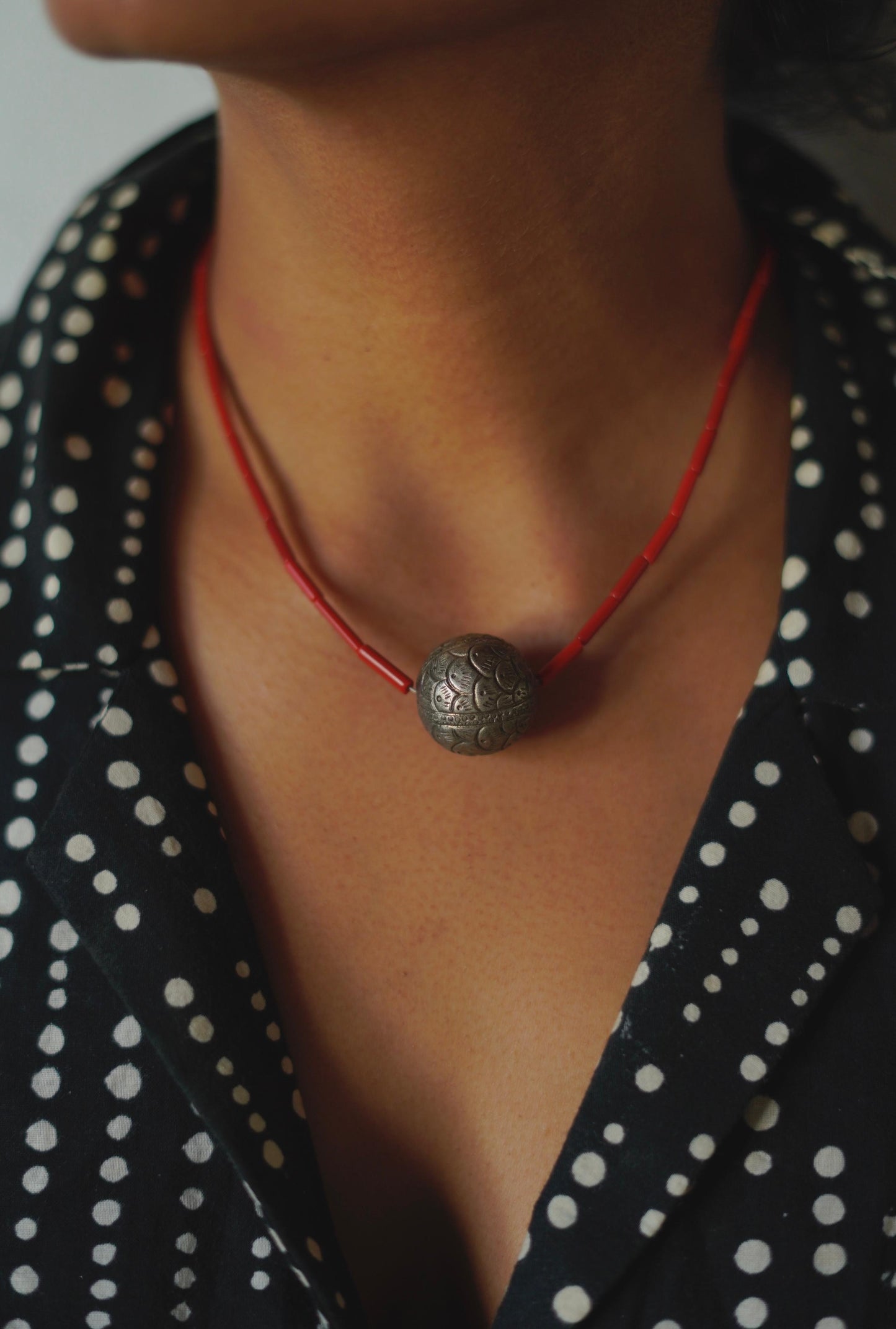 Vintage Etched Fish Bead Necklace on Coral Beads