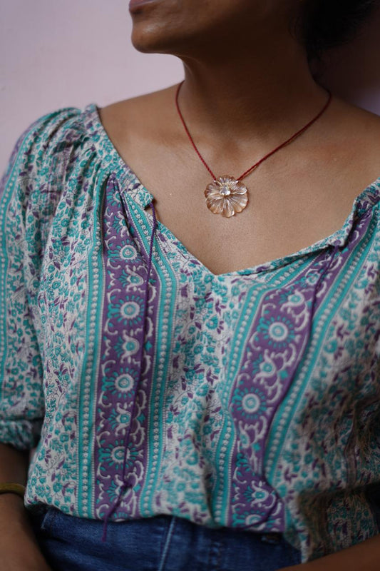 Hand Carved Flower Pendant With Tassel