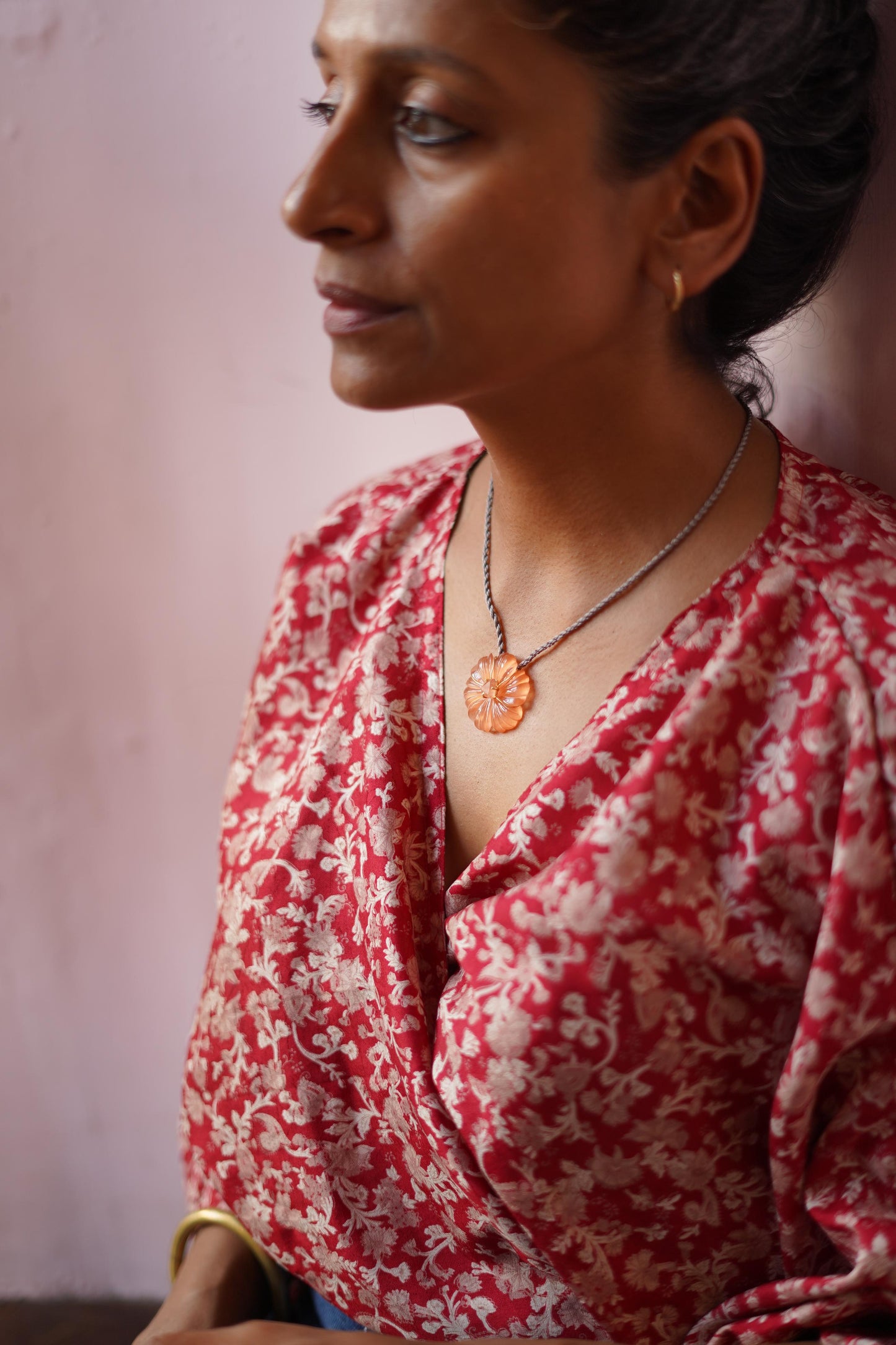 Hand Carved Flower Pendant With Tassel